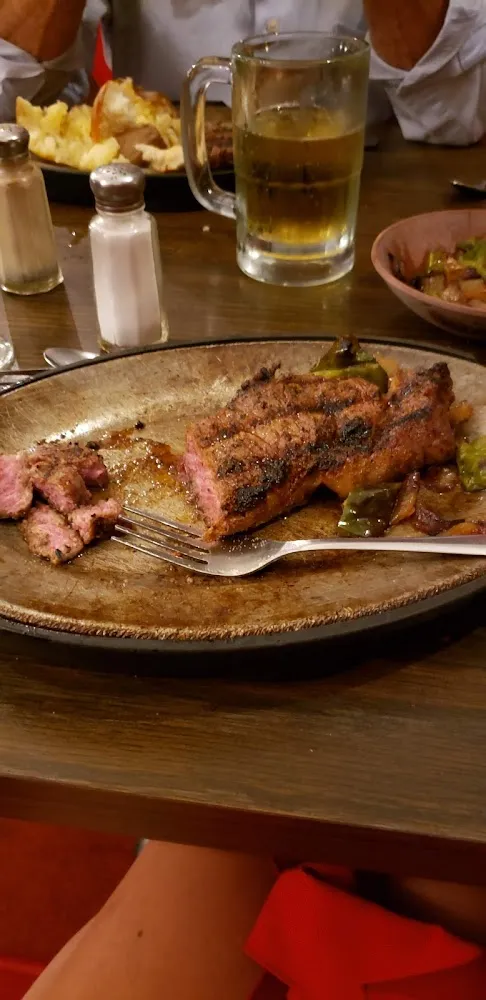 Medium Rare Rib Eye Steak Cooked to Perfection